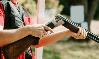 man-opens-shotgun-bolt-after-one-shot-with-smoke